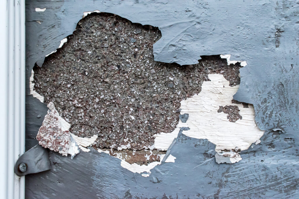 Peeling gray paint